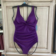 Smismivo One This Has Adjustable Straps And Removable Padding. It Is Fully Lined. It Is Brand New With The Tags. It Does Not Have A Hygiene Strip In It Though. Purple Ruched Swimwear For Beach, Purple Ruched Fitted Swimwear, Purple Fitted Ruched Swimwear, Fitted Purple Ruched Swimwear, Fitted Ruched Purple Swimwear, Color Purple, Womens Swim, Adjustable Straps, One Piece