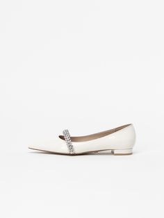 Editor's NoteCHAUSSURE LAPIN's shoes can be styled with a more elevated look.- Shiny jewel strap point- Basic flat heel finished in leather- Flat with a strap on the instep for a stable fit- Made with a standard, regular size lastMeasurements(in.)- Size: KR 220MM - KR 260MM (US 5 - 9)- Heel Height: 0.59 in.*Fits true to the size. Composition & Care- Upper: Cow Leather / Lining: Sheep Leather- Natural leather may have fine scratches and wrinkles- Bright leather can get stained by de Sheep Leather, Leather Flats, Flat Shoes, Natural Leather, Cow Leather, Wrinkles, Sheep, Shoes Flats, Heel Height