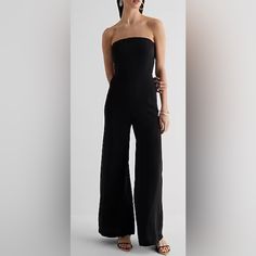 Description A Simple, Yet Chic Strapless Jumpsuit That Is An Easy Pick For Many Occasions. Dress It Up With Heels Or Style It Casual With Sandals. Features & Fabric Strapless Sleeveless Hidden Back Hook And Zipper Closure Lined Bodice Wide Leg; Inseam: 31" Size Up For A More Comfortable Fit 64% Recycled Polyester/ 36% Polyester Imported Strapless Solid Color Jumpsuits And Rompers For Evening, Summer Evening Bandeau Strapless Jumpsuit, Summer Evening Strapless Bandeau Jumpsuit, Elegant Bandeau Strapless Jumpsuit, Chic Solid Color Bandeau Strapless Jumpsuit, Chic Bandeau Strapless Jumpsuit, Strapless Jumpsuit For Evening, Chic Strapless Bandeau Jumpsuit, Chic Solid Bandeau Jumpsuits And Rompers