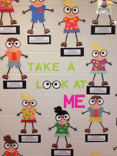 a bulletin board with cartoon characters on it and words that say take a look at me