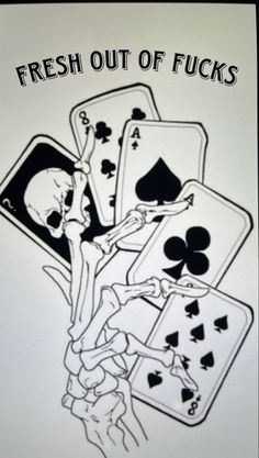 four playing cards are stacked on top of each other, with the same person holding them up