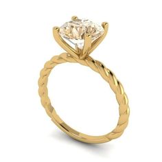 a yellow gold engagement ring with a twisted band and a round cut diamond in the center