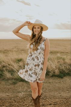 Country concert outfit inspo idea. Western summer dress with boots. Cute western outfit. Cute Printed Summer Sundress, Cute Summer Mini Dress For Vacation, Cute Beach Sundress For Summer, Cute Printed Mini Dress For Summer, Cute Printed Sundress For The Beach, Summer Dress With Boots, Western Summer Dresses, Country Girl Dresses, Cute Western Outfits