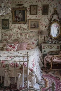 an old fashioned bedroom with floral wallpaper and antique furniture