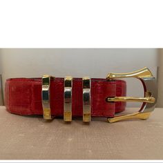 Red Authentic Crocodile Belt. Has Very Nice Enhanced Gold And Silver Tone Buckle. Outside Surface Very Good! Buckle Has Very Minimal Wear. Inside Has Two Small Stains ( In Photo) And Slight Wearing At Hole Punch Sites On Inside. More Than A Belt...Its Wearable Art! Absolutely Gorgeous! Smoke Free Environment Crocodile Belt, Red Belt, Hole Punch, Accessories Men, Gold And Silver, Wearable Art, Silver Tone, Mens Accessories, Buckle