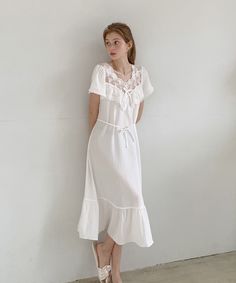 Calf-length dress in soft, comfortable fabric. Lace-trimmed v-neck, short sleeves, and narrow string waist tie. Unlined.- A-line- Midi- Short sleeve- V-neck Summer Loungewear Dresses With Tie Waist, Casual Short Sleeve V-neck Dress For Daywear, Casual Short Sleeve V-neck Dress, Short Sleeve Dresses With Lace Trim For Loungewear, Flowy Maxi Dress With Lace Trim And Short Sleeves, Elegant V-neck Sleepwear For Vacation, Elegant Short Sleeve Midi Dress For Loungewear, V-neck Dress With Tie Waist For Daywear, Flowy Lace Trim Dress For Loungewear