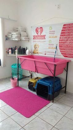 a pink dog bathtub sitting on top of a tiled floor next to a window