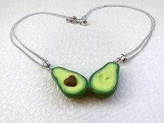 "This is a super adorable BFF necklace for 2 friends. An original gift and amazing way to show your feelings to your friend for any special occasion. THE SET INCLUDES: Two green avocado necklace with two chains of your choice. These realistic avocado charms are made entirely by hand from polymer clay with much of love and attention to every detail. The size of the avocado is 3 cm/ 1.8 cm - approx 1.2\"/ 0.7\" I offer these necklaces with 925 sterling silver chain, 925 sterling silver plated chai Handmade Jewelry Gift For Best Friend, Cute Green Jewelry For Valentine's Day, Cute Pendant Jewelry For Best Friend Gift, Handmade Necklaces For Best Friend Gift On Valentine's Day, Cute Green Necklace For Gifts, Personalized Green Jewelry For Best Friend Gift, Unique Green Necklace For Gift, Novelty Jewelry For Birthday And Mother's Day, Cute Green Necklace For Gift