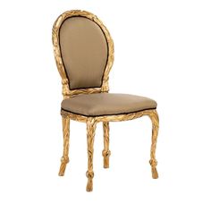 an ornate gold chair with a beige upholstered seat and back cushion on white background