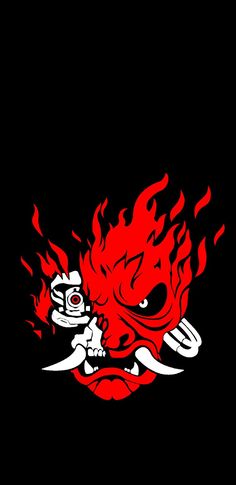 a red and black background with an evil demon on it's face in flames