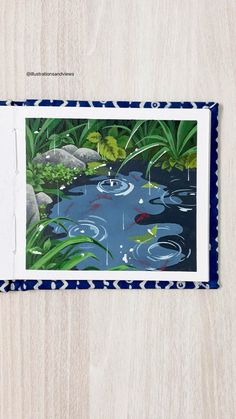 a card with an image of a pond in the middle of some plants and rocks