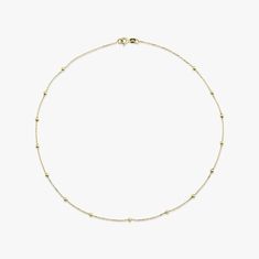 Our new simple and elegant satellite chain necklaces, as always made in 14k solid gold. Delicate golden beads float along the chain, creating an exquisite and elegant design. ★ Necklace Features• Gold Kt: 14K Solid Gold (all pieces are stamped for authenticity)• Available Gold Color: Yellow Gold• Bead Diameters: 2.5 mm