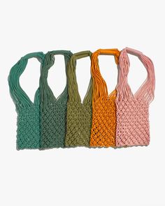 Our line of Kokoro Original products infuses practical purpose with warmth and style, honouring both the aesthetic and tradition of Japanese Craftsmanship. This hand-woven crocheted bag makes a beautiful grocery tote or picnic bag. Size: Approx. 13" H (10" Drop) x 11.5" W Size: Length with Shoulder Straps: 25" Material: 100% Cotton Made in Vietnam Product # KKR03 Code: NWS Rectangular Macrame Beach Bag For Daily Use, Daily Use Rectangular Macrame Beach Bag, Summer Crochet Bag Hand Knitted For Shopping, Daily Use Handwoven Crochet Yarn Bag, Rectangular Woven Yarn Straw Bag, Rectangular Summer Straw Bag With Macrame, Handwoven Crochet Yarn Bag For Daily Use, Green Crochet Straw Tote Bag, Crochet Tote Straw Bag For Market