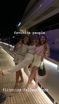 three women posing on a boat deck at night with the caption favorite people,