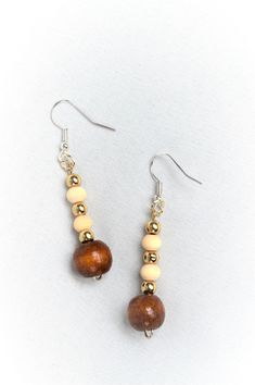 Gold/Brown--Womens Dangle Earrings--Gift For Her--Boho Jewelry--Handmade Jewelry These earrings are handmade in Lancaster Pa -- I make them all from my small shop. I can also do custom styles/sizes.   Please message me with additional questions or comments. Nickel-free Brown Bohemian Earrings, Nickel-free Beige Dangle Earrings, Beige Nickel Free Dangle Earrings, Brown Bohemian Dangle Earrings, Beige Nickel-free Dangle Earrings, Earthy Brown Earrings For Festivals, Handmade Bohemian Brown Plug Earrings, Handmade Brown Bohemian Plug Earrings, Nickel-free Brown Beaded Earrings For Festival