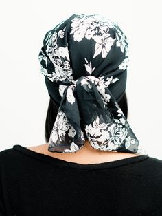 This pretied head scarf is from Linda Christen Designs Life Style Collection. This sheer black and white floral chiffon head scarf can be worn in many ways. Are you going for a trendy look? Protect your hair and preserve your hairstyle at the same time with this light weight head scarf. The scarf makes it easy to lay your hair down and protects your hair from the sun and the elements while you look fabulous doing so. Perfect for looking fashionable and trendy while running errands or meeting a f Chic Summer Headwrap, Black Bohemian Bandana For Spring, Bohemian Black Bandana For Spring, Spring Bohemian Black Bandana, Elegant Headscarf For Spring Beach Outings, Chic Summer Headscarf One Size, Floral Print Bandana For Summer, Chic One-size Summer Headscarf, Summer Floral Print Bandana