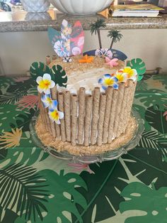 a decorated cake sitting on top of a table