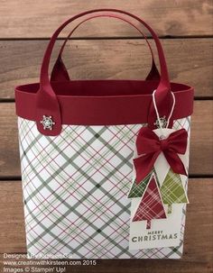 a christmas bag with a red bow on it