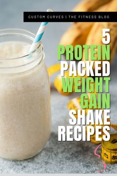 a glass jar filled with protein packed weight gain shake next to bananas and measuring tape