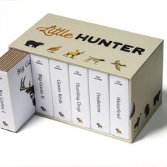 the little hunter book set is open to reveal its contents and features pictures of animals