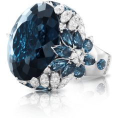 Indulge in pure luxury with the 18k White Gold Ghirlanda Couture Ring from Pasquale Bruni. This exquisite piece features a breathtaking London Blue Topaz gemstone that sparkles in the light, surrounded by a halo of diamonds that perfectly complement its blue hues. The ring's intricate design is reminiscent of delicate garlands, creating a truly unique and timeless piece that exudes elegance and sophistication.Crafted from the finest 18k white gold, this ring is a true masterpiece of Italian craftsmanship, with every detail thoughtfully considered to create a piece that is both stunning and durable. The Ghirlanda Couture Ring is a perfect choice for any occasion, whether you're looking to add a touch of glamour to your everyday look, or to make a bold statement at a special event.With its t Pasquale Bruni, Diamond Birthstone, Jewelry Appraisal, London Blue Topaz, London Blue, Diamond Wedding Rings, White Gold Rings, Cocktail Rings, Jewelry Branding