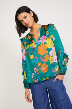 This floral-print blouse offers a welcome punch of color and pattern to the season's ensembles. Detailed with a clean placket and ruffle trim at the shoulders and sleeves, the V-neck top will become an instant favorite. •Split neckline with placket •Long sleeves •Elasticized cuffs •Ruffle trim •Relaxed fit •Relaxed Fit DIMENSIONS •Standard: 24.75" Length Item number 2230399-1100% Polyester Botanical Floral Prints, Floral Tattoo Sleeve, Floral Sleeve, Floral Print Blouses, Woven Top, Floral Ruffle, Green Blouse, Print Blouse, V Neck Tops