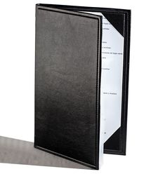 a black binder sitting on top of a table next to an open file folder