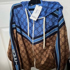 Brand New Gucci Oversized Track Jacket, Size Xs, Tags Attached. Luxury Gucci Hooded Outerwear, Luxury Hooded Gucci Outerwear, Designer Gucci Hooded Outerwear, Designer Gucci Outerwear, Designer Gucci Long Sleeve Outerwear, Designer Long Sleeve Gucci Outerwear, Blue Gucci Winter Outerwear, Designer Blue Gucci Outerwear, Blue Designer Gucci Outerwear