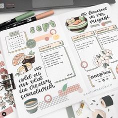 an open planner with food and drinks on it