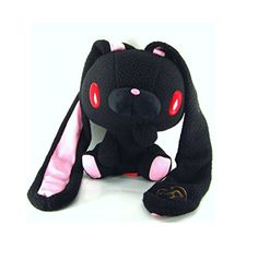 a black stuffed animal with red eyes and ears