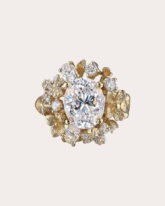 an oval diamond surrounded by leaves on a gold ring with diamonds in the shan shan shan shan shan shan shan shan shan shan shan shan shan shan shan shan shan shan shan shan shan shan shan shan shan shan shan shan shan shan