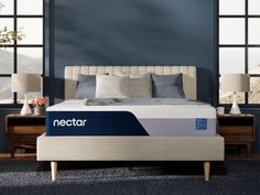 the nectar mattress is made up and ready to be used as a night stand or bed