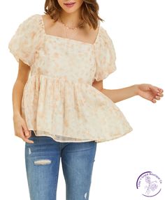 Indulge in romance with our floral puff-sleeved blouse. The square neck and smocked back add a flirty touch to this babydoll top. Perfect for date night or a day out with friends, it's the ideal combination of sweet and stylish. Material: 100% Polyester Chic Puff Sleeve Peplum Top For Brunch, Spring Square Neck Puff Sleeve Top With Smocked Back, Feminine Puff Sleeve Top With Smocked Back For Spring, Feminine Smocked Bodice Blouse With Square Neck, Feminine Smocked Top For Brunch, Feminine Blouse With Smocked Bodice And Square Neck, Flowy Puff Sleeve Blouse For Brunch, Feminine Floral Print Smocked Top With Puff Sleeves, Flowy Puff Sleeve Blouse With Smocked Bodice