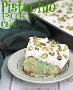 a piece of pistachio poke cake on a plate