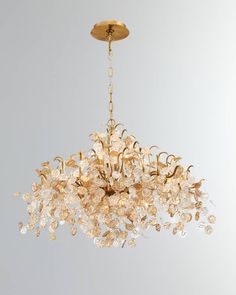 a chandelier hanging from the ceiling in a room