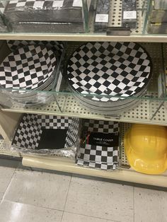 black and white checkered plates on display in a store