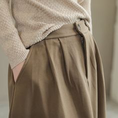 Details: Gender: Women Item Type: Skirt Material: Wool Season: Spring, Autumn Pattern: Solid Style: Casual, Loose, Retro Waist Type: Elastic Waist Size: One Size Waist: 64.00 - 84.00 cm/ 25.20 - 33.07 " Length: 77.00 cm/ 30.31 " Hip: 126.00 cm/ 49.61 " Hem: 184.00 cm/ 72.44 " Winter Midi Skirt In Solid Color, High Waist Pleated Skirt For Winter, Relaxed Khaki Skirt For Fall, Fall Long Khaki Skirt, Beige Winter Midi Skirt, Fall Beige Long Skirt, Khaki Skirt For Workwear, Khaki Pleated Midi Skirt, Winter Beige Lined Skirt