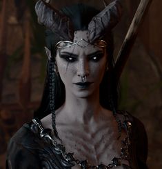 a woman with horns and chains on her head