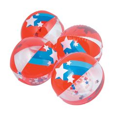 three red, white and blue balls with stars on them sitting next to each other