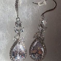 Mary St pierre added a photo of their purchase Elegant Drop Wedding Jewelry, Elegant Teardrop Jewelry For Wedding, Sparkling Crystal Teardrop Earrings For Wedding, Glamorous Sparkling Teardrop Earrings For Wedding, Elegant Pear-shaped Teardrop Earrings For Wedding, Glamorous Pear-shaped Jewelry For Wedding, Classic Drop Wedding Jewelry, Classic Drop Jewelry For Wedding, Formal Bridal Drop Earrings With Sparkling Stones