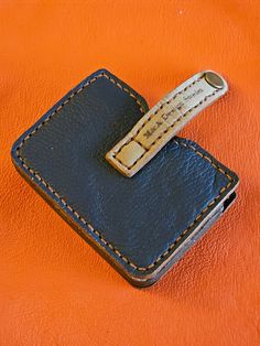 A versatile and compact card holder and wallet.  Made with the best cow leather.  For those who care about being stylish.  You can order this in any color you like. Leather Rectangular Card Holder With Card Slots, Rectangular Wallets With Key Clip, Classic Leather Card Holder With Key Clip, Luxury Rectangular Trifold Wallet, Leather Card Holder With Card Slots, Leather Card Holder With Slots, Rectangular Leather Trifold Wallet For Everyday Use, Handmade Leather Travel Card Holder, Leather Rectangular Card Holder With Coin Pocket