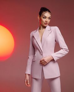 -blazer length along the back 27 1/2 inches or 70 cm -sleeve length 24,4 inches or 62 cm -pants length along the side seam 45,2 inches or 115 cm -inseam length (from the crotch to the bottom) 35,4 inches or 90 cm 2-piece womens blazer trouser suit for office, business meetings, formal events and special occasions. Also perfectly combines with sneakers so after a long and tiring business day you can change you heels to sneakers and still look chic. DETAILS -  straight pants -  high rise -  blazer is buttoned -  lined -  front pockets (not functional)  -  padded shoulders MATERIAL Premium quality suiting fabric, which consists of viscose mostly and a bit of polyester and elastane SIZES The models in photos are wearing a size S (4) Available in 4 sizes: 2 US numeric  BUST 32-34 inches or 82-8 Chic Pink Blazer For Business, Pink Lapel Collar Blazer For Business, Pink Single Breasted Blazer With Lapel Collar, Pink Single-breasted Blazer With Lapel Collar, Pink Single Breasted Blazer, Pink Suits For Spring Evening, Pink Single Breasted Blazer With Notch Lapel, Pink Single-breasted Blazer With Notch Lapel, Fitted Pink Outerwear For Business