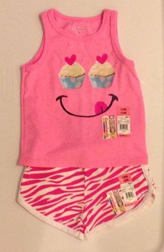 Super cute infant girl's two piece shirt and shorts set, from Garanimals, new with tags! PLEASE NOTE-Shirt is a size 12 months, Shorts are a size 18 months This set features a pink tank with an cupcake smiley face applique and coordinating pink and white animal print knit shorts with an elasticized waist. Shirt, 100% cotton, shorts, 90% cotton, 10% polyester Check out my other items! Be sure to add me to your favorites list! I am always more than happy to combine shipping! Two Piece Shirt, Animal Print Shorts, Face Applique, Shirt And Shorts Set, Pink Cupcakes, Toddler Clothing, Print Shorts, Pink Tank, Baby & Toddler Clothing