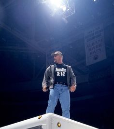 a man standing on top of a white object