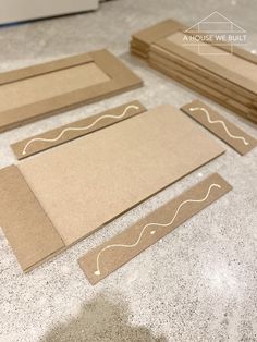 several pieces of cardboard sitting on top of a counter