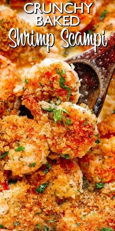 crumby baked shrimp scampi is being scooped from a casserole dish