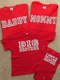 three red shirts with the words daddy, mommy and little brother printed on them