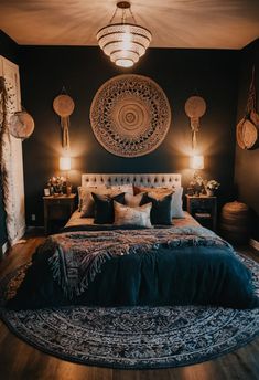 a large bed sitting in a bedroom on top of a wooden floor next to two lamps