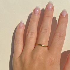 Whether gracing a casual brunch or a formal event, the Liana Wave Ring stands out. Its design ensures comfort without compromising on style, making it perfect for daily wear. The clear stone accent adds just the right amount of sparkle, making it a versatile piece for all occasions.  Hypoallergenic, nickel and lead free. Tarnish resistant 14k Gold Vermeil H2O sensitive. Before showering or working out, remove your plated jewelry. Clean your piece by buffing gently with a dry cloth and store it in your pouch. Birthstone Charm Necklace, Stocking Fillers For Him, Wavy Design, September Birthstone Jewelry, Stack Ring, Wave Ring, Forever Jewelry, Gold Gifts, Jewelry Ring Box