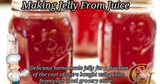 two jars filled with red liquid sitting on top of a white table next to a sign that says making jelly from juice